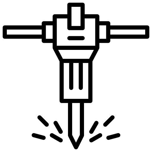 A jackhammer with sparks, illustrating construction work and heavy-duty equipment. Relevant for discussing tools in construction projects.